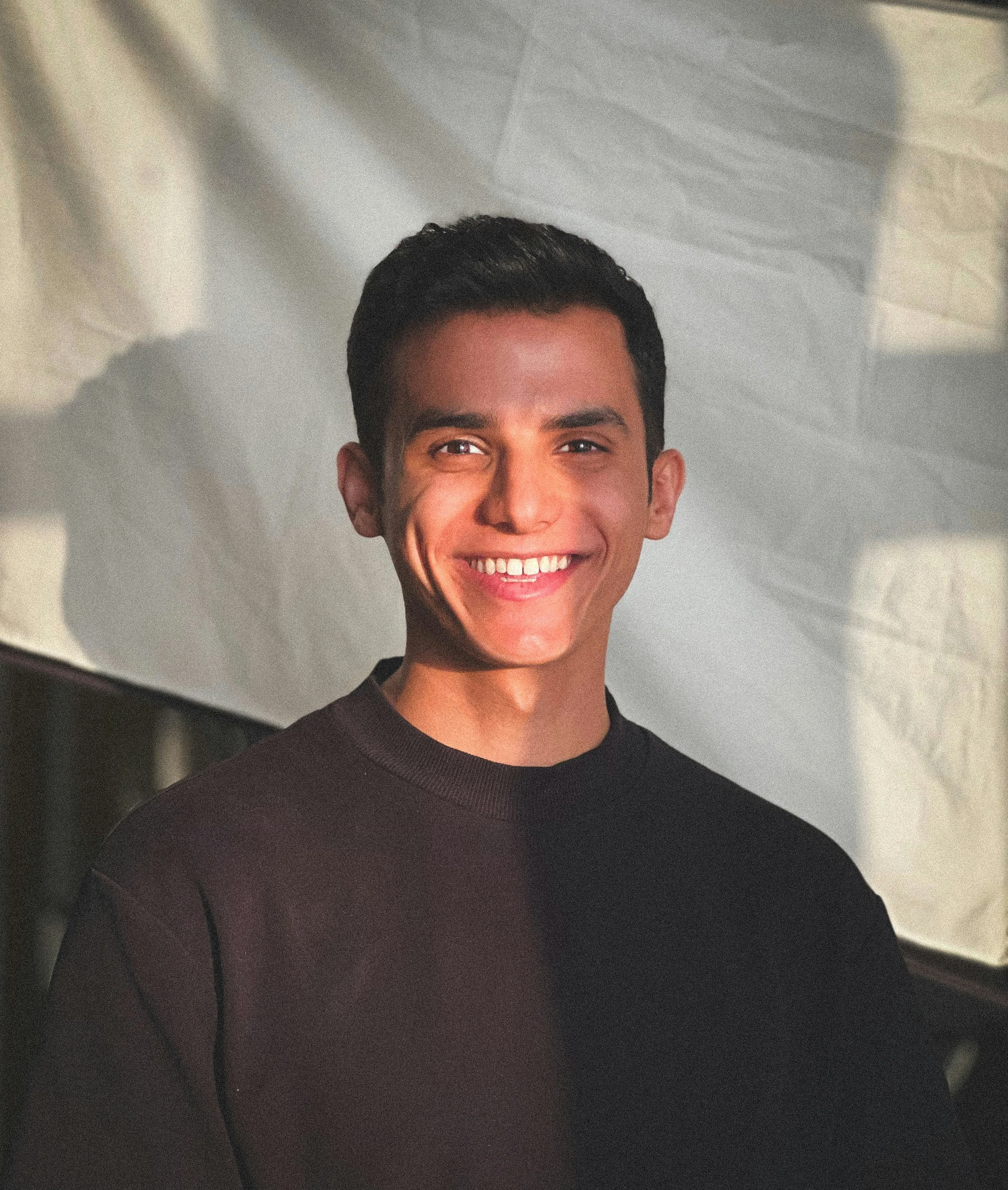 Smiling man portrait — try AI background changer free online