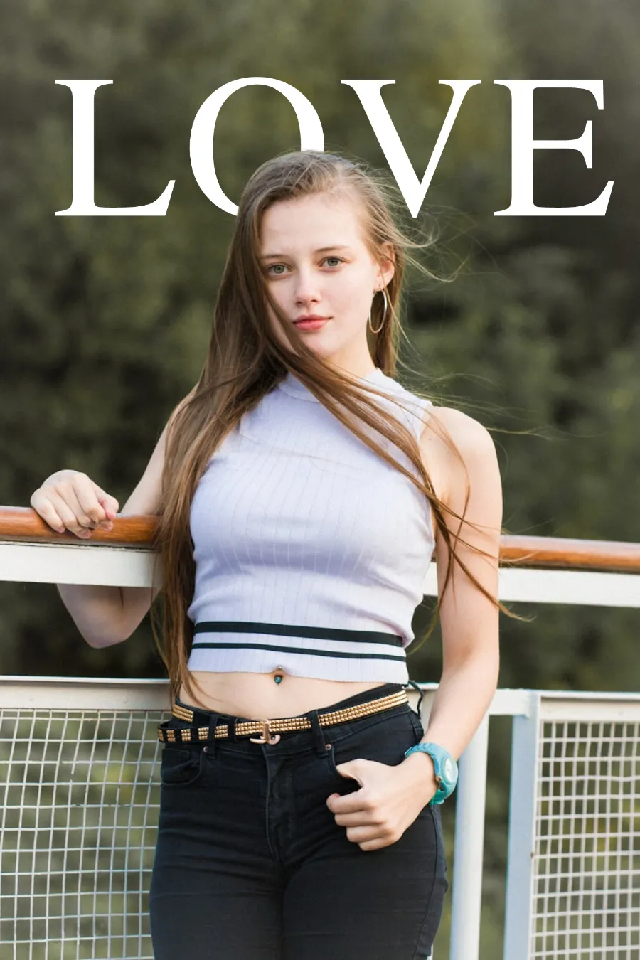 Text behind image example - LOVE text overlaid behind woman portrait outdoor